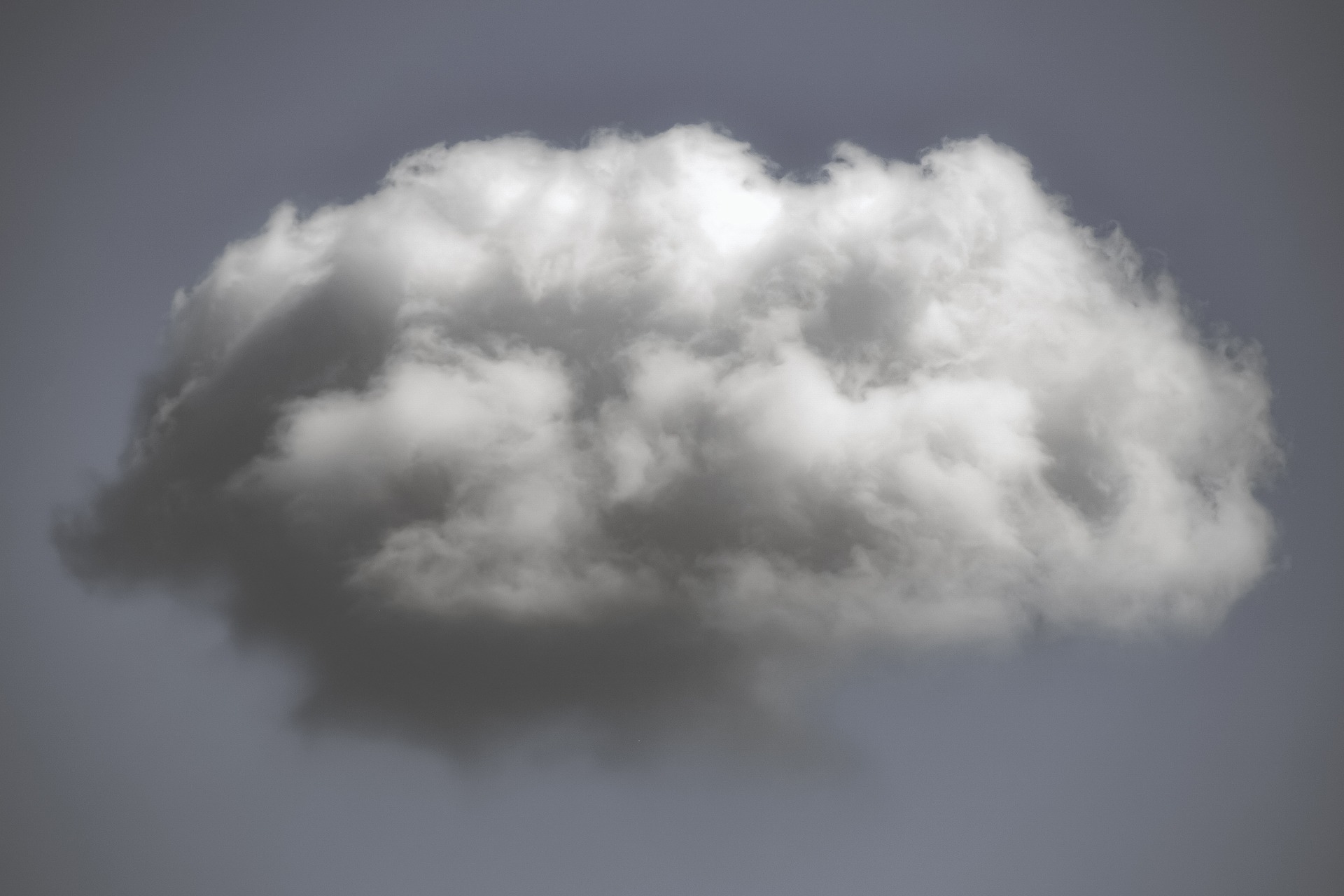 cloud in shades of white and grey on grey background
