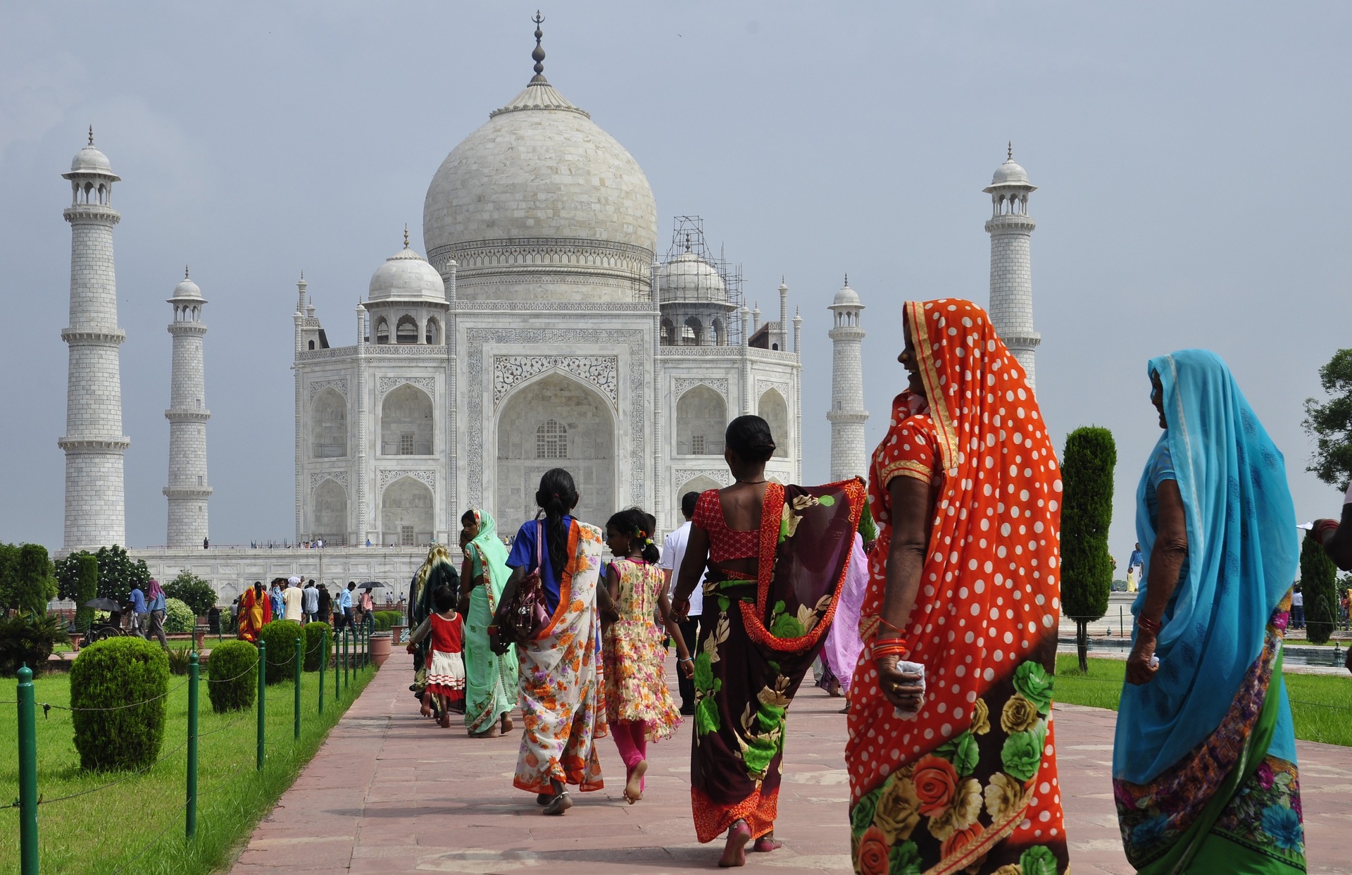 Women in sari's visiting the taj mahal