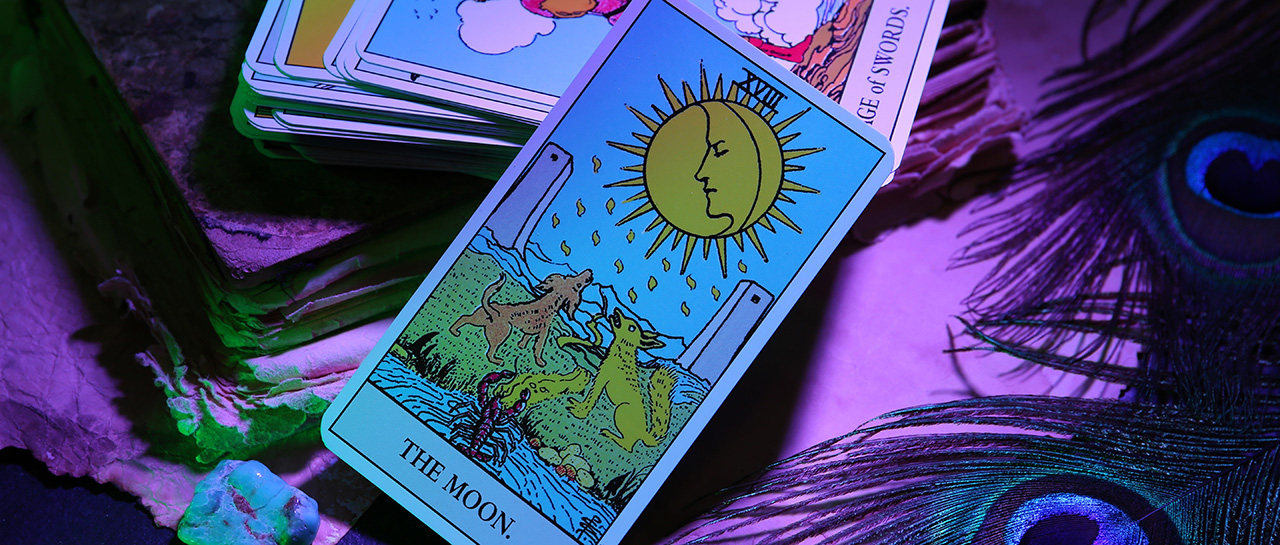 image of the moon card on a purple background